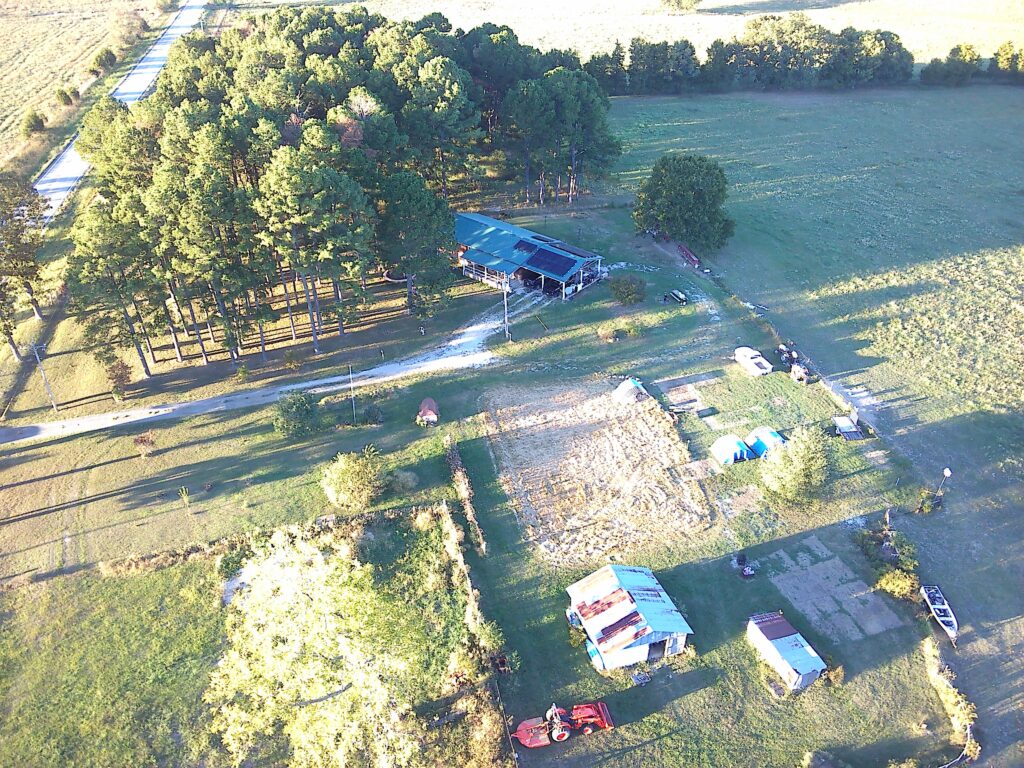 Introducing IBK Farms A Green Roof Farm House taken from a drone looking down on the property